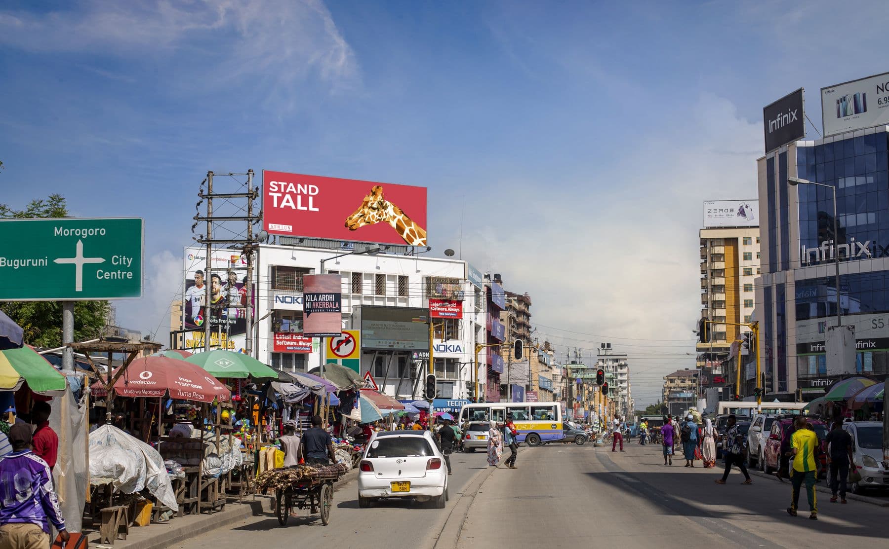 Ashton billboards above a busy junction in Dar es Salaam