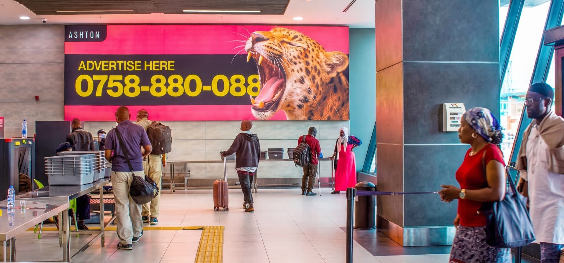 A digital screen at the security entrance of the SGR terminal